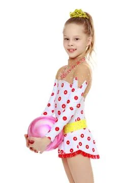 Gymnast does exercises with a ball Stock Photos