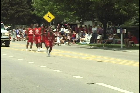 Gymnast Does Flip in Parade Stock-Footage 297651