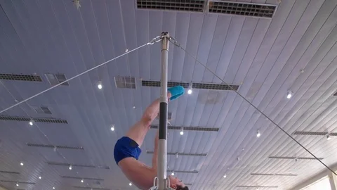 Gymnast giant exercises on high horizontal bar HD slow-motion gymnastics video Stock Footage 73123777