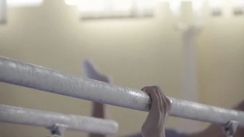 Gymnast hand prepares for exercises on parallel bars HD video. Athlete chalking Stock-Footage 73124561