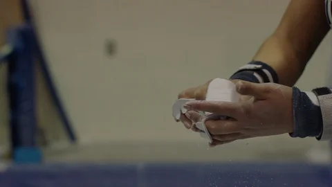 Gymnast hands rubbing on chalk Stock Footage 106591155