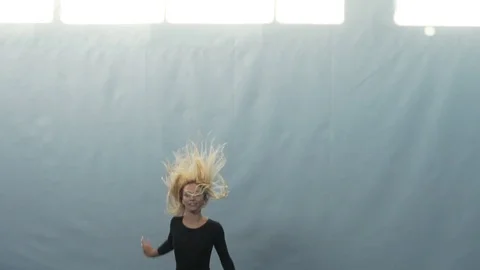 Gymnast jumping on the trampoline, slow motion Stock Footage