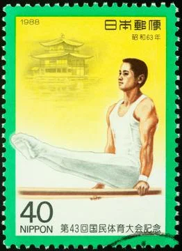 Gymnast on parallel bars Stock Photos