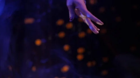 The gymnast performs an acrobatic number on a mirror ball Video stock 104878613