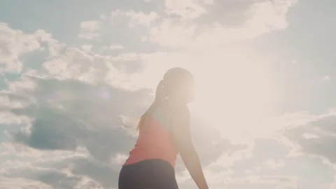 Gymnast Performs Tricks on the Beach Stock Footage 139434992