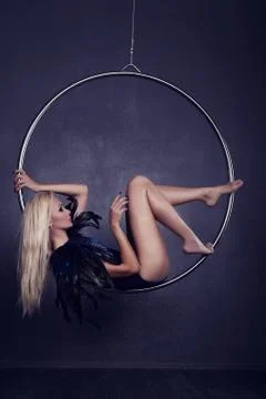 Gymnast on a ring in circus under a dome Stock Photos