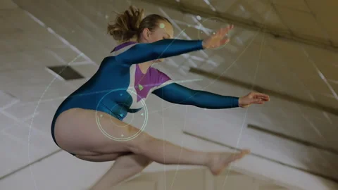 Gymnast stepping onto beam initiating split leap while overlay tracing path in Stock Footage 312905001