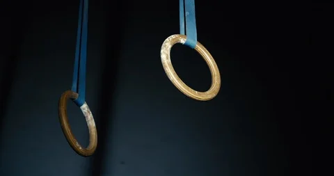 Gymnastic Olympic Rings on dark background Stock Footage 104127230