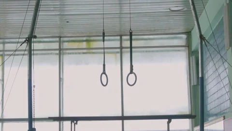 Gymnastic Rings At The Gym on the window background Stock Footage 87147812