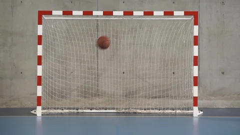 Gymnastics with goal and ball bouncing. Stock Footage 89608997
