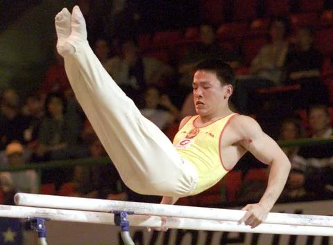 Gymnastics  -  Parallel Bars/xu - Mar 2000 Stock Photos