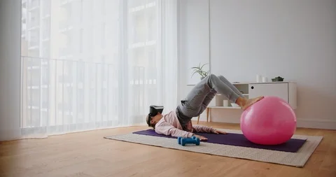 Gymnastics workout with virtual reality goggles Stock Footage 122235440