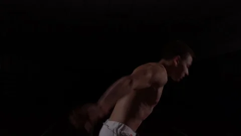 Gymnasts doing somersaults close-up Stock Footage 129472667