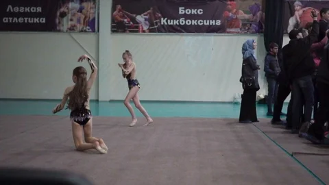 Gymnasts train in class Stock Footage 101690966