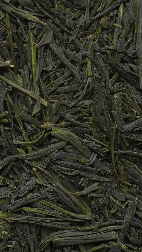 Gyokuro dried tea background. Vertical video. Stock Footage 277070657
