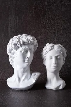 Gypsum statue of David's head and the Greek goddess. Stock Photos