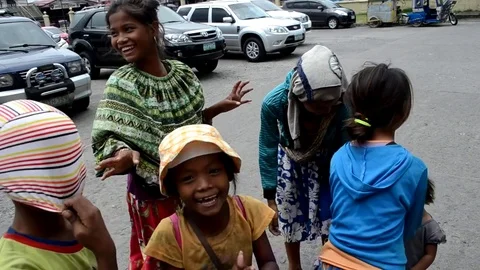 Gypsy family begging at church yard Stock Footage