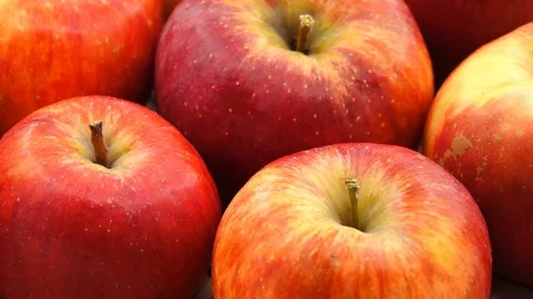 Gyration red ripe apples close-up. Stock Footage 128319261