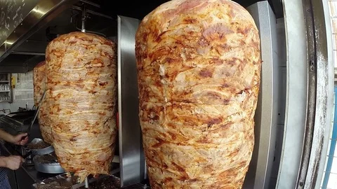 Gyros Roasted Slowly On Vertical Rotating Grill Stock Footage 93898505