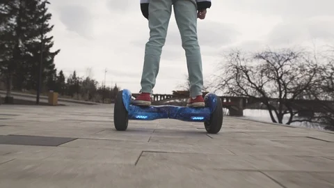 Gyroscope. Close-up of a hoverboard in motion. Controlling the Balance GyroScoot Stock Footage 88768274