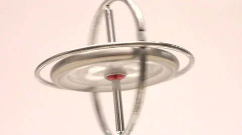 Gyroscope wheel spinning quickly. Unbalanced and falling. Stock Footage