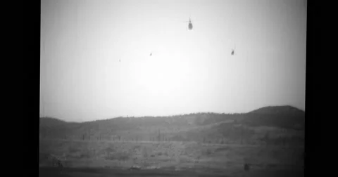H-13D helicopter flying in sky Stock Footage
