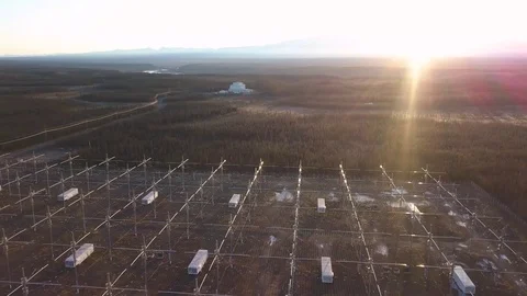 HAARP research site, Aerial pullback as sun rises over the horizon. Stock Footage 118679618