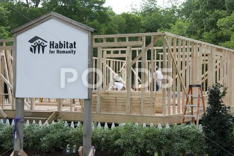 Habitat for Humanity building a new house Stock Photos