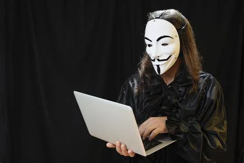 Hacher with computer Stock Photos