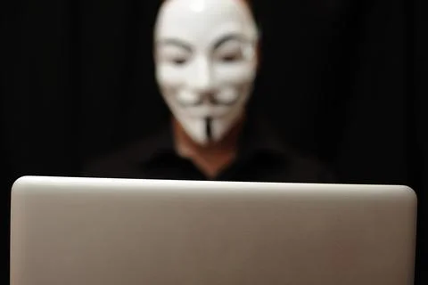 Hacher with computer Foto stock