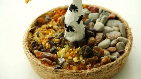 Hack in the form of a birch made of amber crumbs Stock Footage 81432539