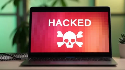 Hacked Laptop Computer Displaying a Message on its Screen Stock Footage 168307272