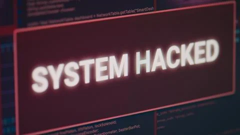 Hacked system alert message flashing on computer screen Stock Photos
