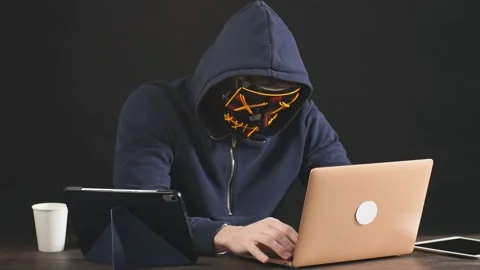 Hacker after successful getting access to bank card Stock Footage 123473305
