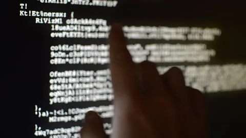 Hacker analyzing code program for software Stock Footage 199020887