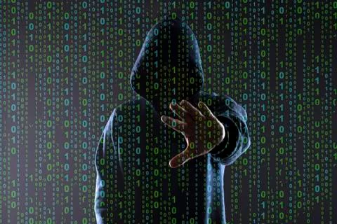 Hacker and binary code Stock Photos