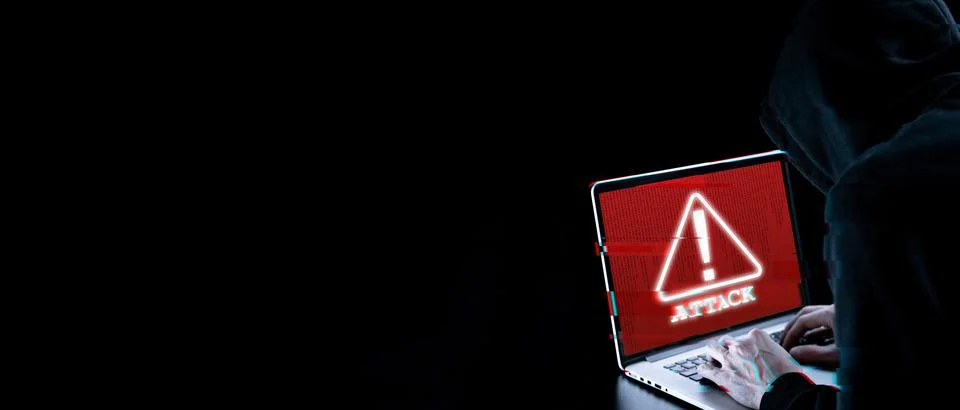 Hacker attack cyber security. Digital laptop in hacker man hand isolated on b 스톡 사진