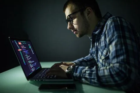 Hacker attack the server in the dark. Hacker attack network and servers, code Foto stock