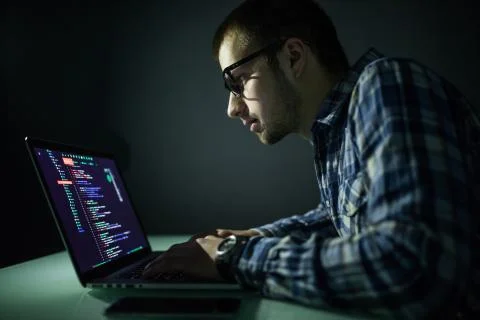 Hacker attack the server in the dark. Hacker attack network and servers, code Foto stock