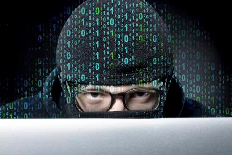 Hacker in balaclava Stock Photos