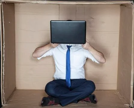 Hacker behind computer Stock Photos