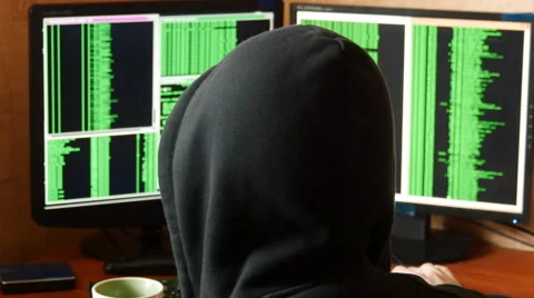 Hacker breaking code and drinking from the cup at your desk. Stock Footage 63088076