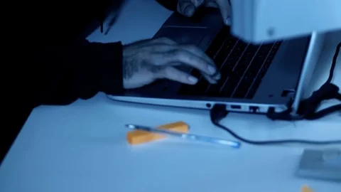 Hacker Breaking Computer Code at night Stock Footage 83700200