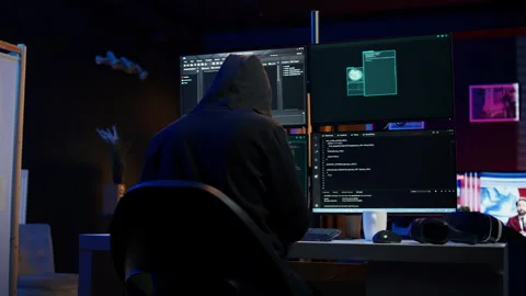Hacker breaking down security systems defenses using rogue scripts Stock Footage 275749943