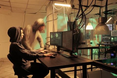 Hacker breaking into internet network system, coding computer worm 스톡 사진