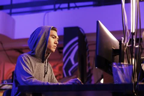 Hacker breaking law, doing data mining Foto stock