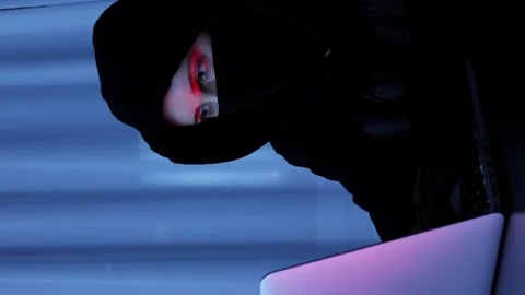 Hacker breaking online security protection on laptop computer. Vertical video Stock Footage 255252623