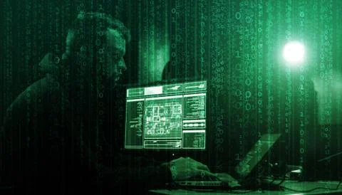 Hacker is breaking server using computers. Cybercrime concept. 写真素材