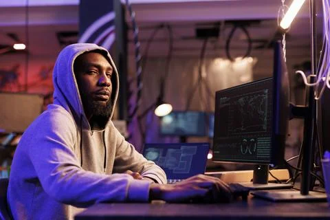 Hacker breaking into system portrait Foto stock