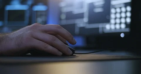 Hacker - Close up, hand. Handheld footage of a shady man working on the computer Stock Footage 98339898